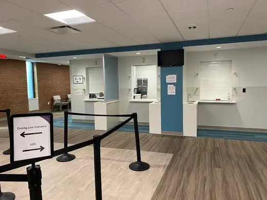 Dosing line entrance with service windows at McLeod Centers For Wellbeing, a detox center in Charlotte.