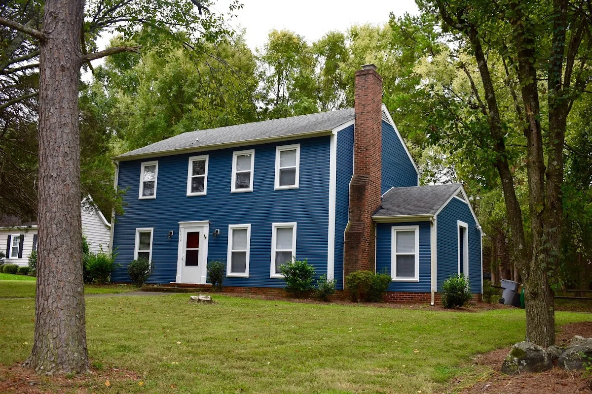 Exterior view of Charlotte sober living home — blue
