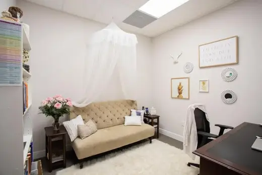 Cozy therapy room with a sofa at Harmony Recovery Group's sober living home in Charlotte.