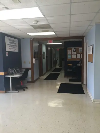 Welcoming reception area in a treatment center in Charlotte with informational brochures and a calm atmosphere.