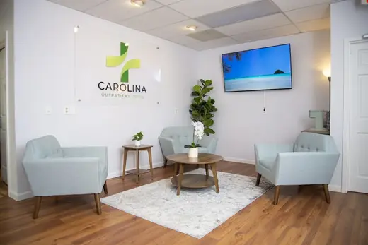 Welcoming seating area with modern decor at treatment center in Charlotte.