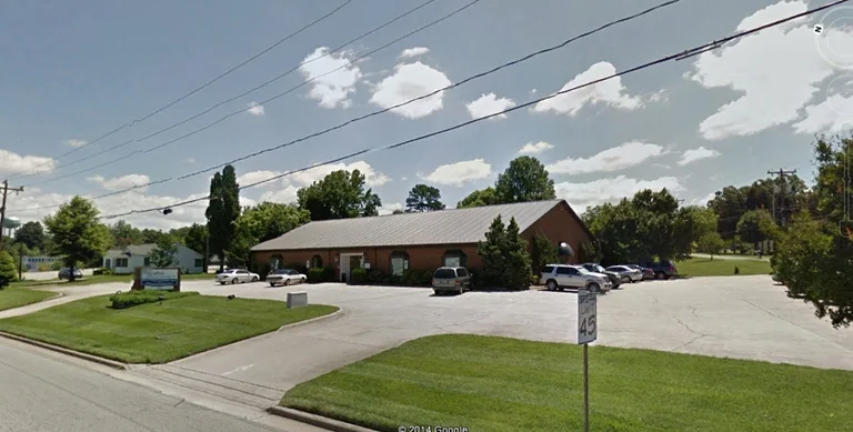 Exterior view of Greensboro detox center — road surface